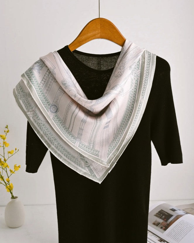 Detail of texture showing gray-sage saddle and column motifs in 16mm lace structure