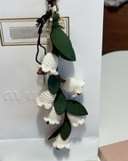 The Lily-of-the-Valley Charm