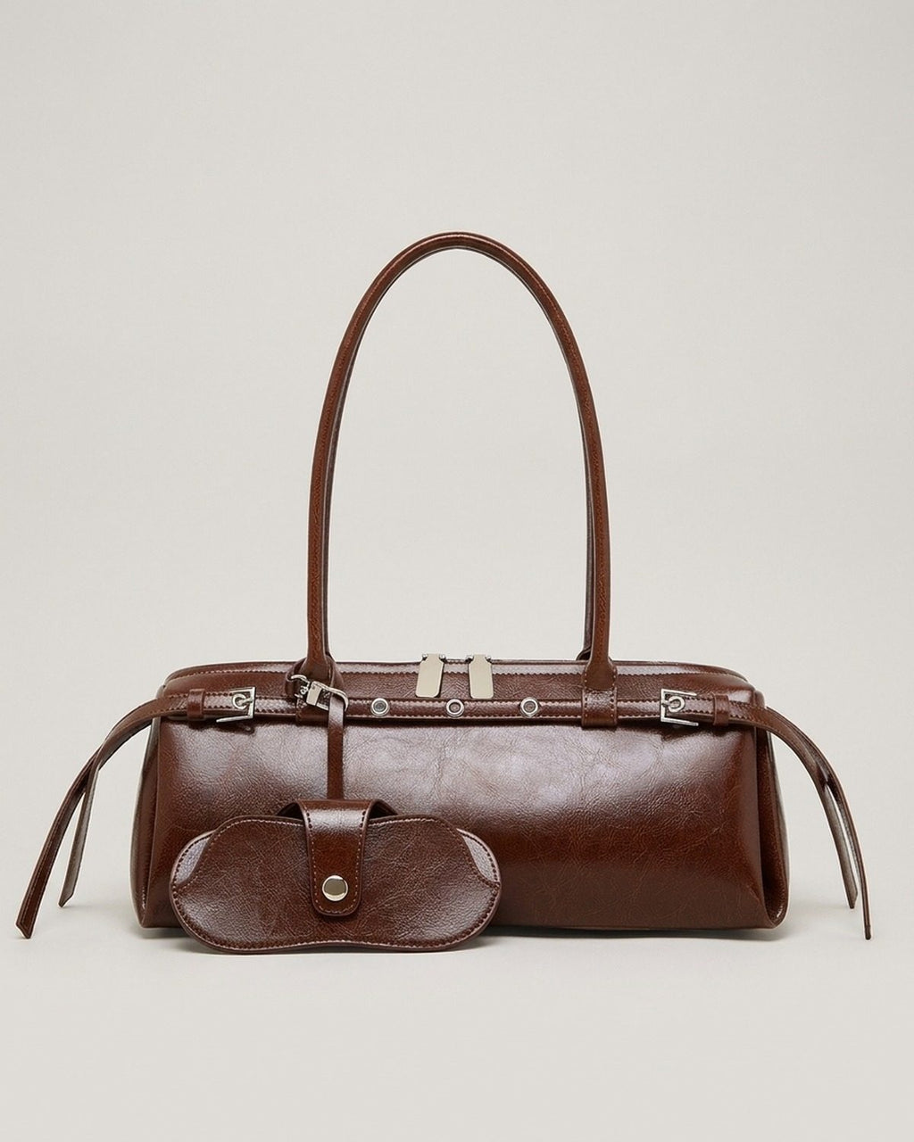 Wildfool The Roma Bowling Bag in Espresso — oil-waxed leather bowling bag with belted top and snap pouch