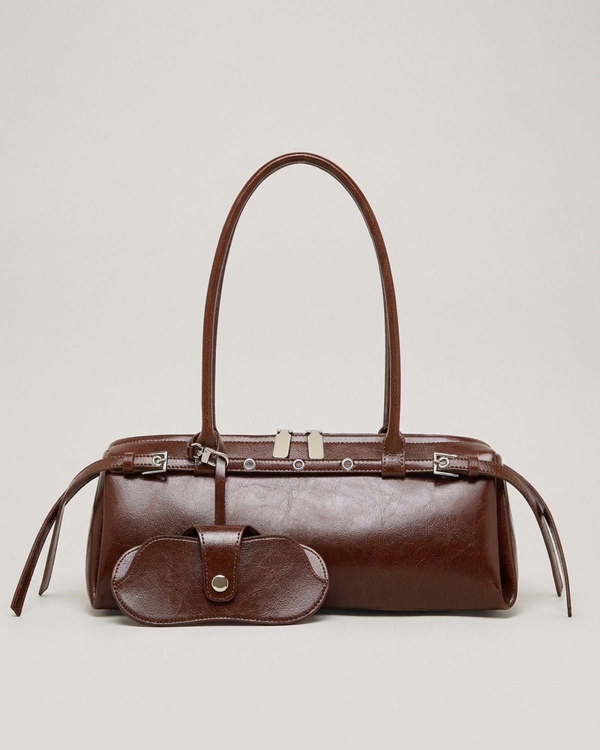 Wildfool The Roma Bowling Bag in Espresso — oil-waxed leather bowling bag with belted top and snap pouch