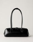 Wildfool The Cannes Baguette Bag in Black — long smooth leather baguette with two slim straps