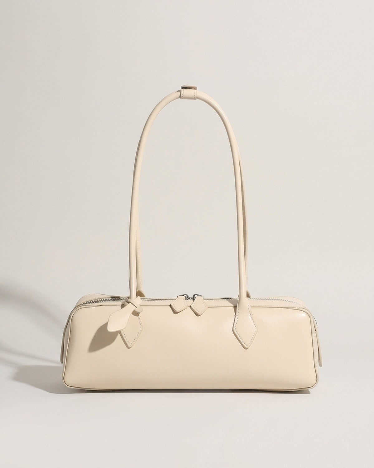 Wildfool The Cannes Baguette Bag in Ivory — off-white smooth leather baguette bag, silver hardware