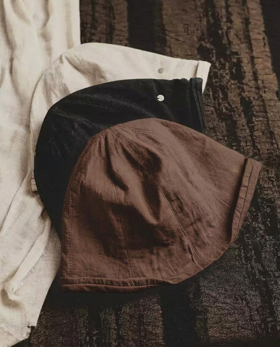 Wildfool Washed Linen Docker Cap colour range — white, black and espresso shown together