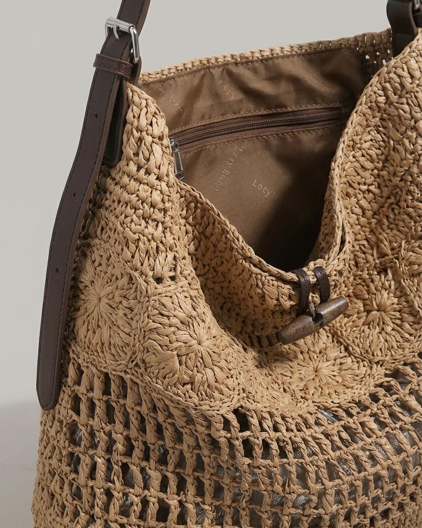Wildfool Hollow-Weave Tote in Gray — three-quarter view with lock clasp visible