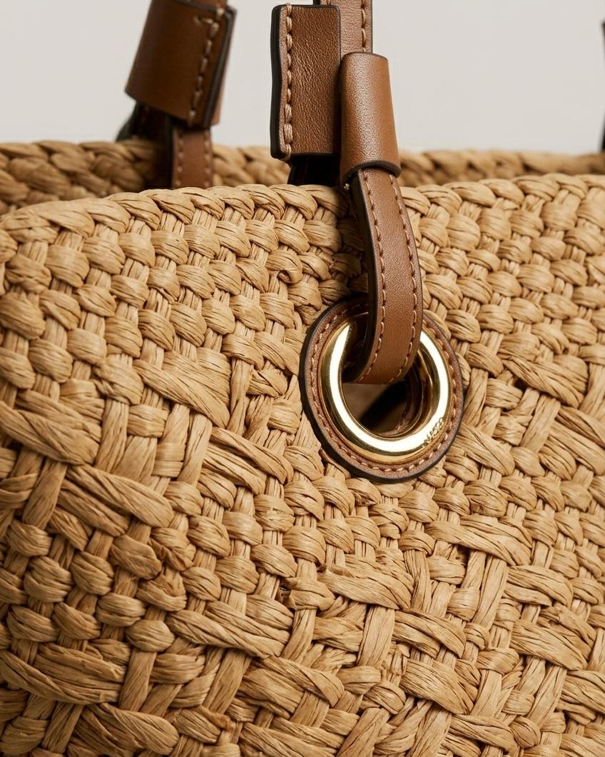 Cream basket tote styled with linen shirt — lifestyle flat lay with produce and novel