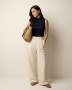 Wildfool brown grass weave tote worn on forearm — medium-soft texture visible