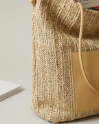 Wildfool black woven tote — flat lay on neutral background