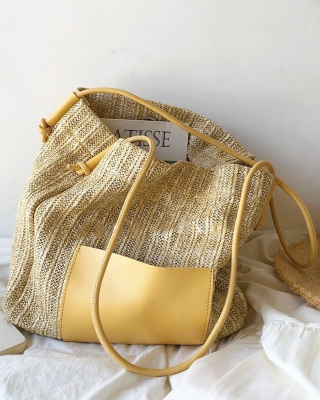 Wildfool black woven tote — flat lay on neutral background