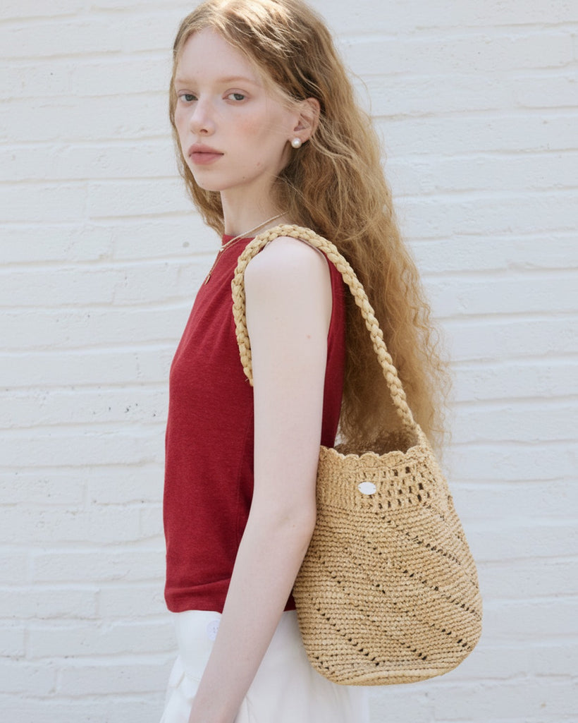 The Scalloped Raffia Bucket Bag
