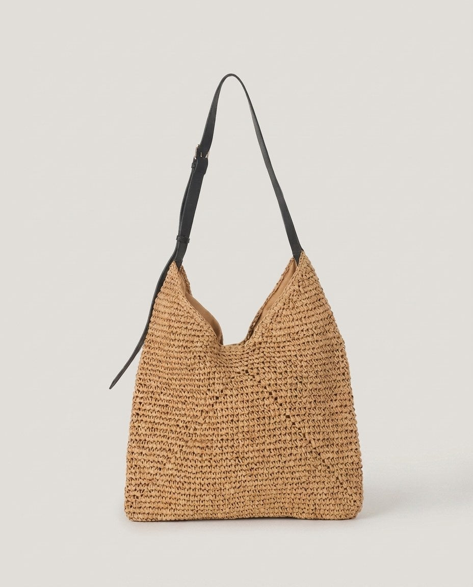 Wildfool The Menton Woven Shoulder Bag in Camel — hand-crocheted paper straw tote with black strap