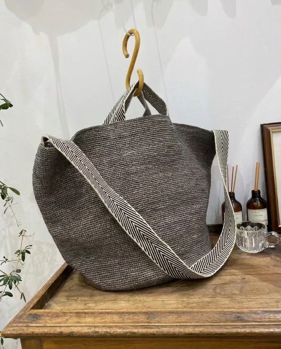Wildfool The Taormina Raffia Tote in Grey — charcoal raffia tote with black-and-cream herringbone webbing strap
