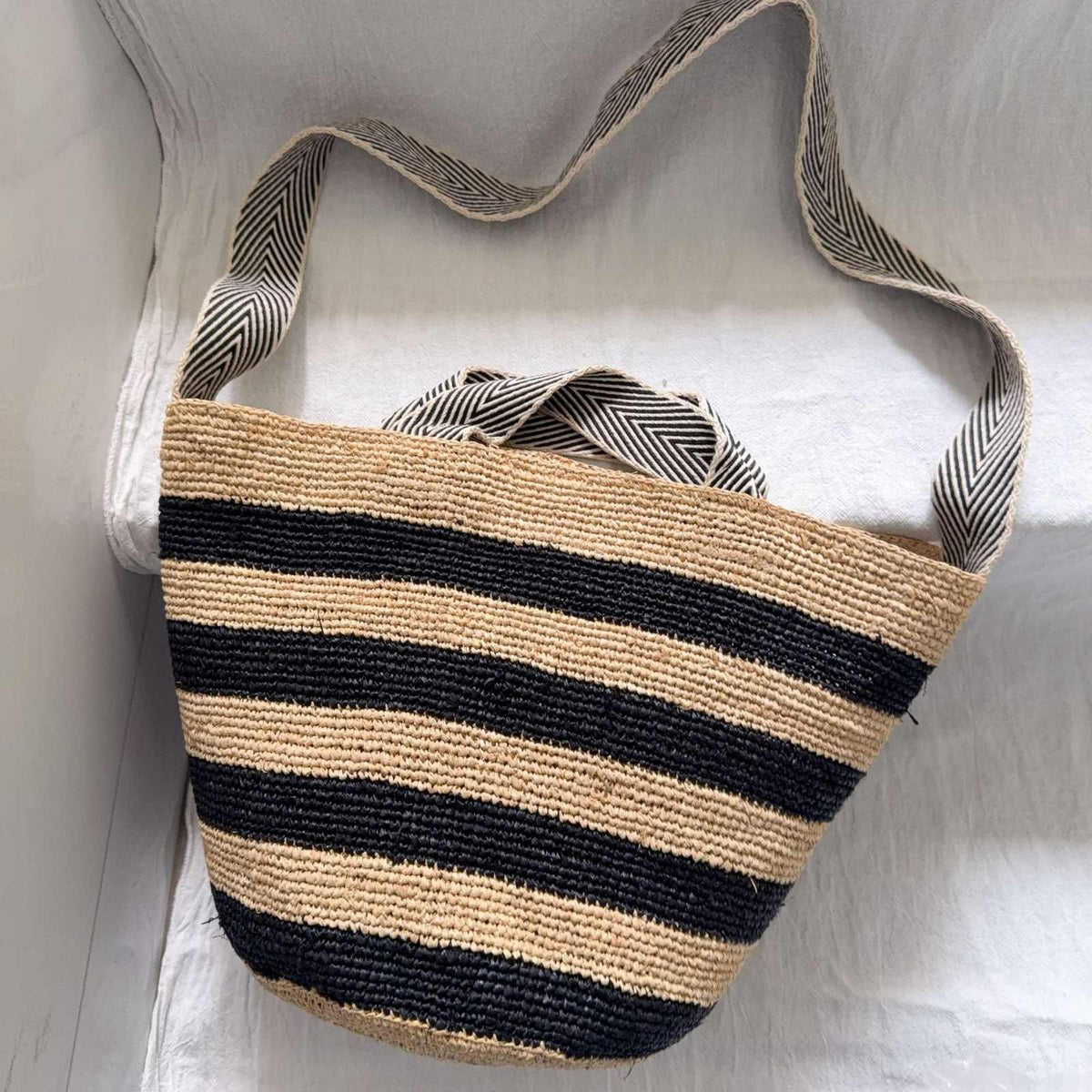 Wildfool The Taormina Raffia Tote in Striped — raffia tote with black-and-cream herringbone webbing strap