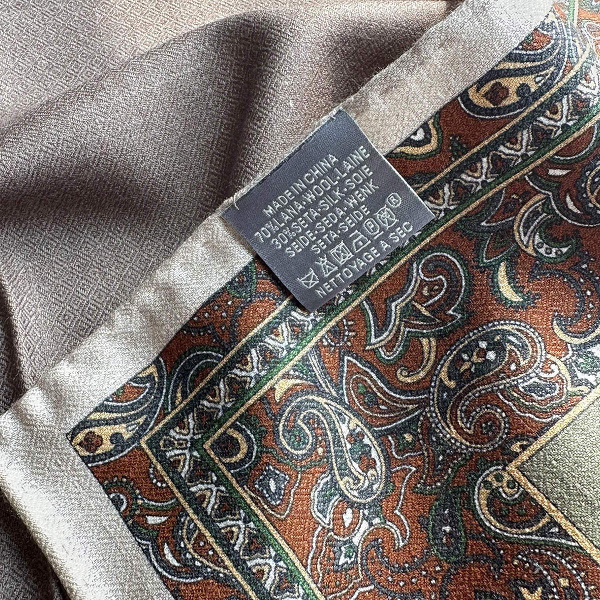 Reverse olive-green side of Wildfool camel-green reversible silk wool scarf