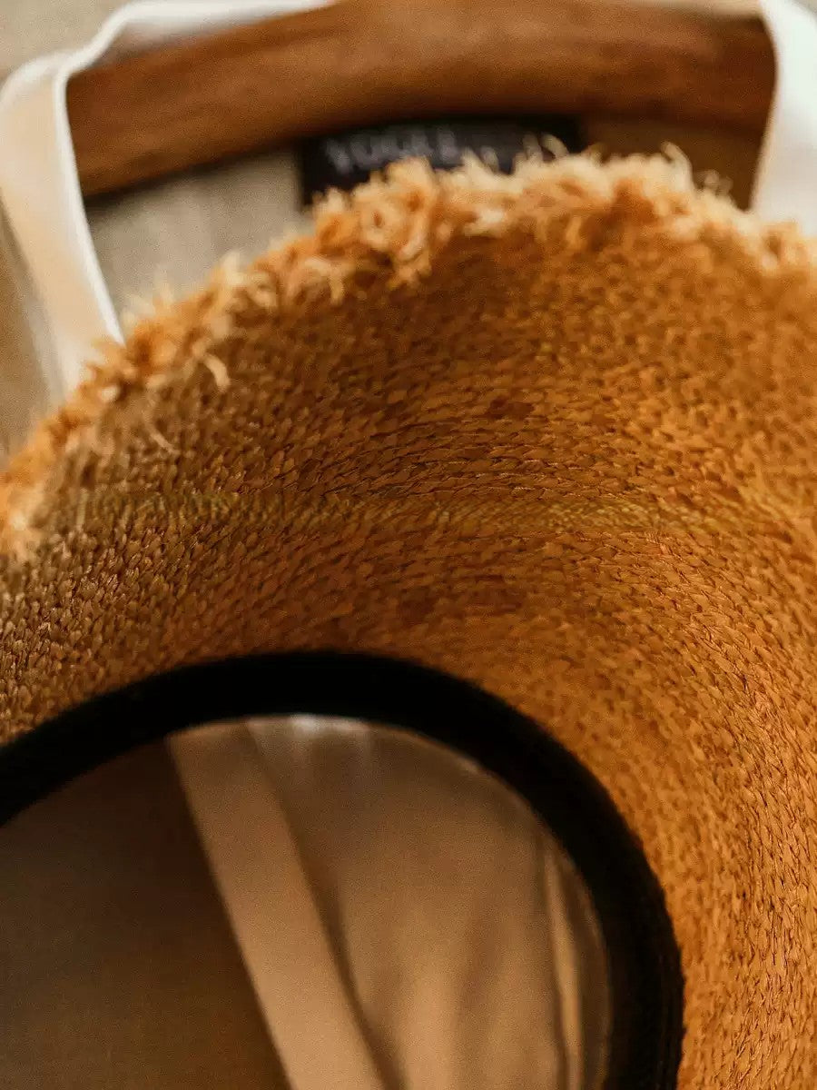 Wildfool Raffia Open-Crown Visor — close-up of hand-woven raffia straw texture
