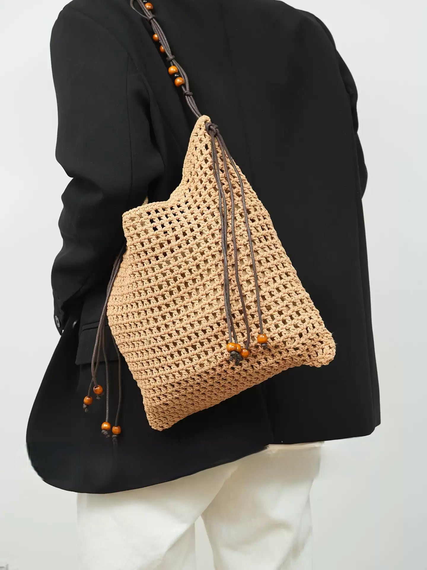 Wildfool Beaded Grass Tote in Khaki - Styled on Model - PP Straw Weave, Beaded Detail, Drawstring Closure