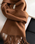 The Dune 100% Cashmere Scarf knotted and laid flat, fringe at both ends