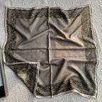 Wildfool silk wool scarf in camel-khaki with refined paisley border — full flat lay