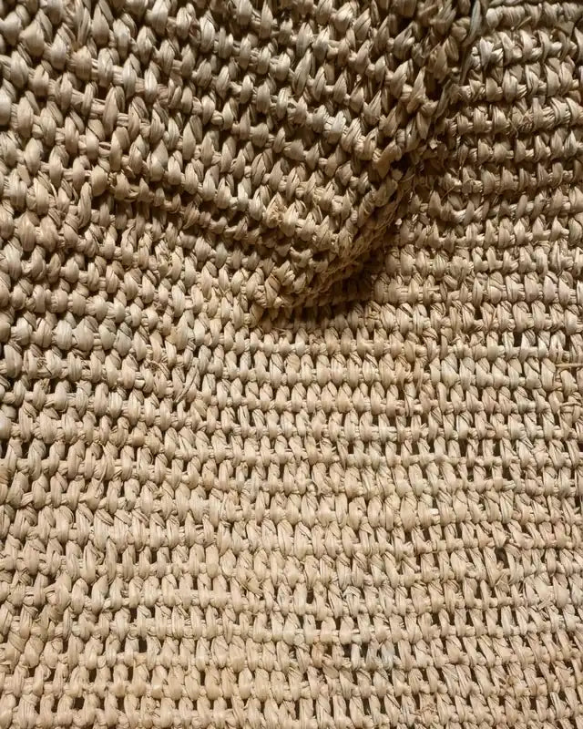 Madagascar long-fibre raffia weave texture, macro detail showing natural color variation