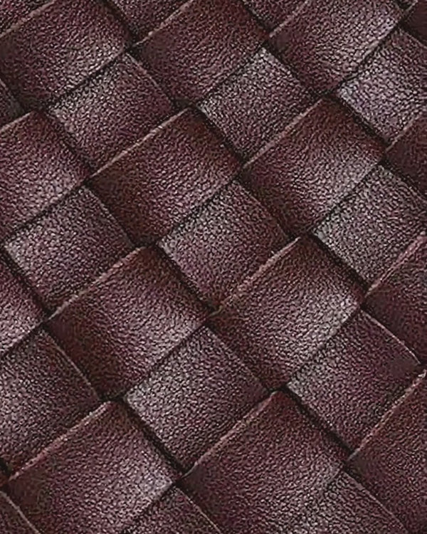 The Ravello Woven Leather Shoulder Bag, light moving across the woven top-grain leather
