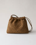 Wildfool The Mantova Drawstring Pouch in Caramel, caramel woven brushed cowhide drawstring pouch with slim strap