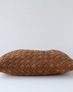 Wildfool The Mantova Drawstring Pouch in Caramel, pulled shut and laid flat