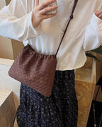 Wildfool The Mantova Drawstring Pouch, worn crossbody, front view