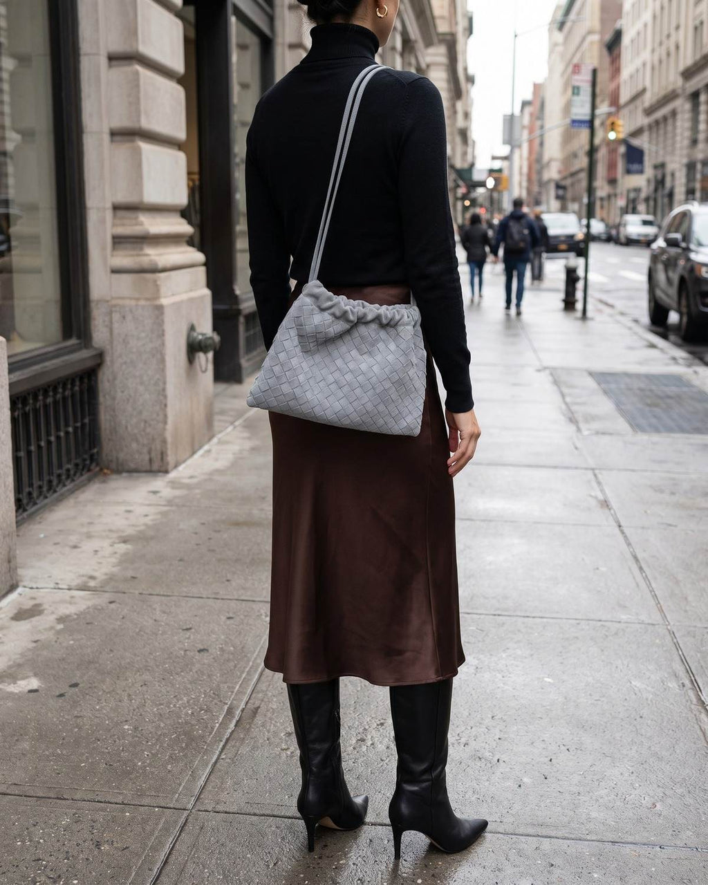 Wildfool The Mantova Drawstring Pouch in Grey, worn on the shoulder