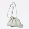 Wildfool The Matera Woven Pouch in Ivory — soft off-white hand-woven lambskin drawstring bag