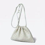 Wildfool The Matera Woven Pouch in Ivory — soft off-white hand-woven lambskin drawstring bag