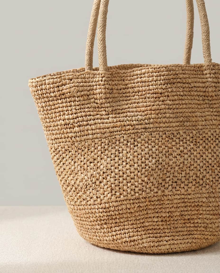 Wildfool The Hand-Woven Raffia Market Tote — flat lay with summer accessories