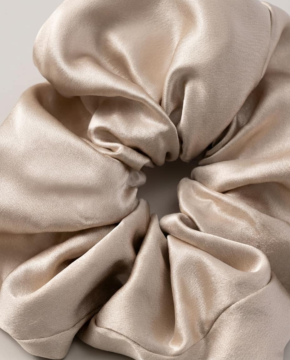 Wildfool heavyweight silk scrunchie worn on a low ponytail — back of head, natural light