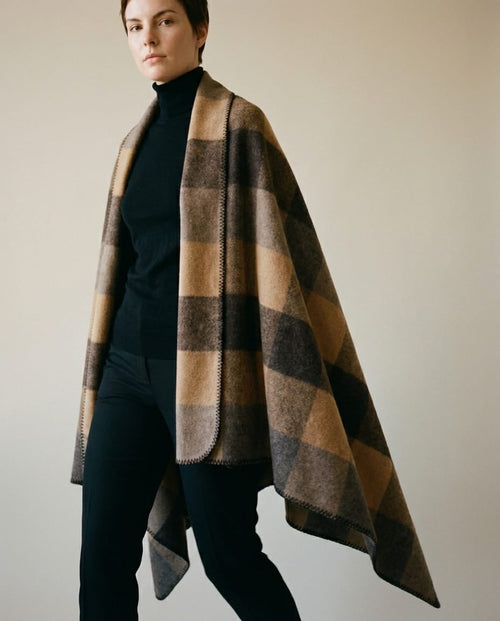 Wildfool 830g heritage wool cabin blanket in vintage stripe — full flat lay on a wood floor