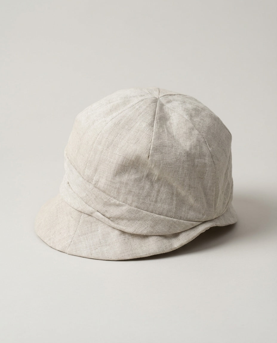 Wildfool 100% Linen Packable Bucket Hat in Oatmeal Beige - Lifestyle Photography - 100% Linen with Wire Brim, Fully Packable, Adjustable Fit