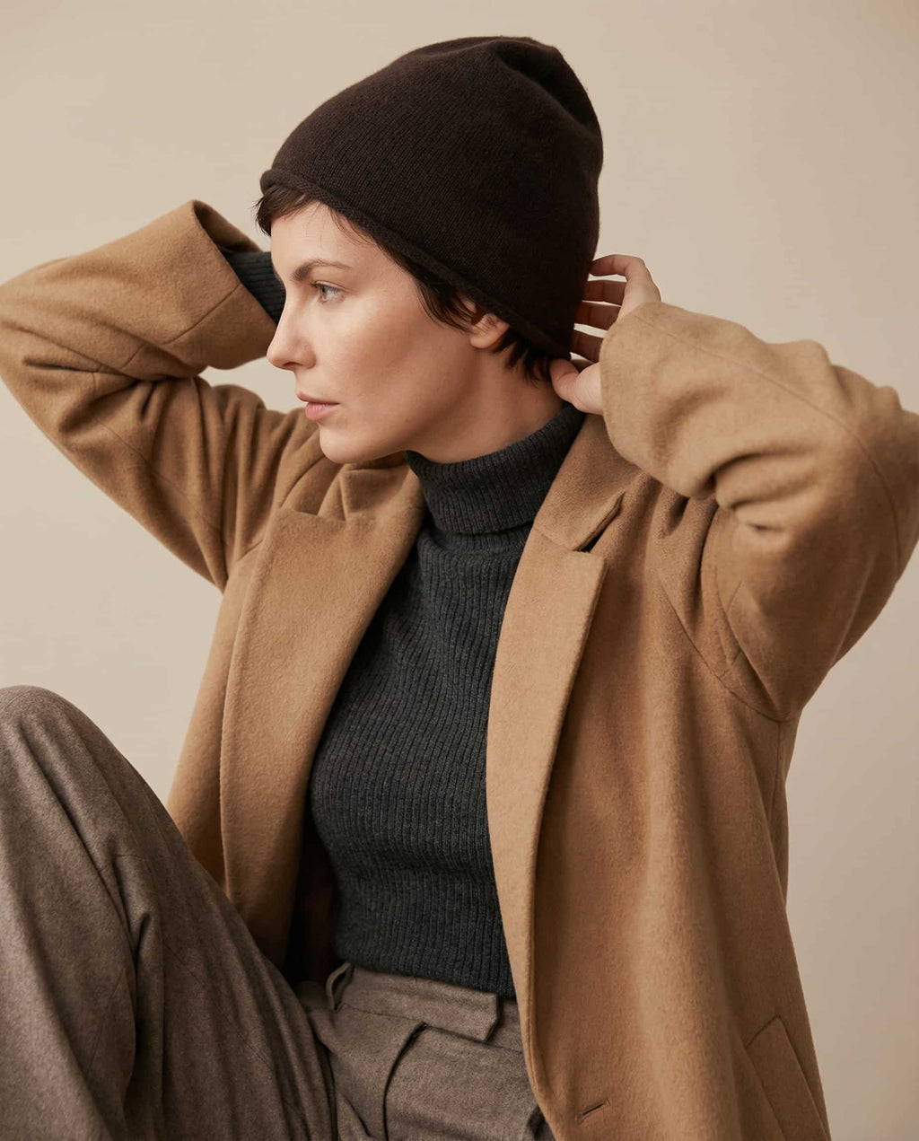 Wildfool Alashan cashmere beanie folded into a soft fold for travel
