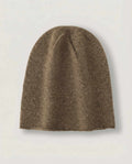 Alashan cashmere cloud beanie worn on model — three-quarter view, soft natural light