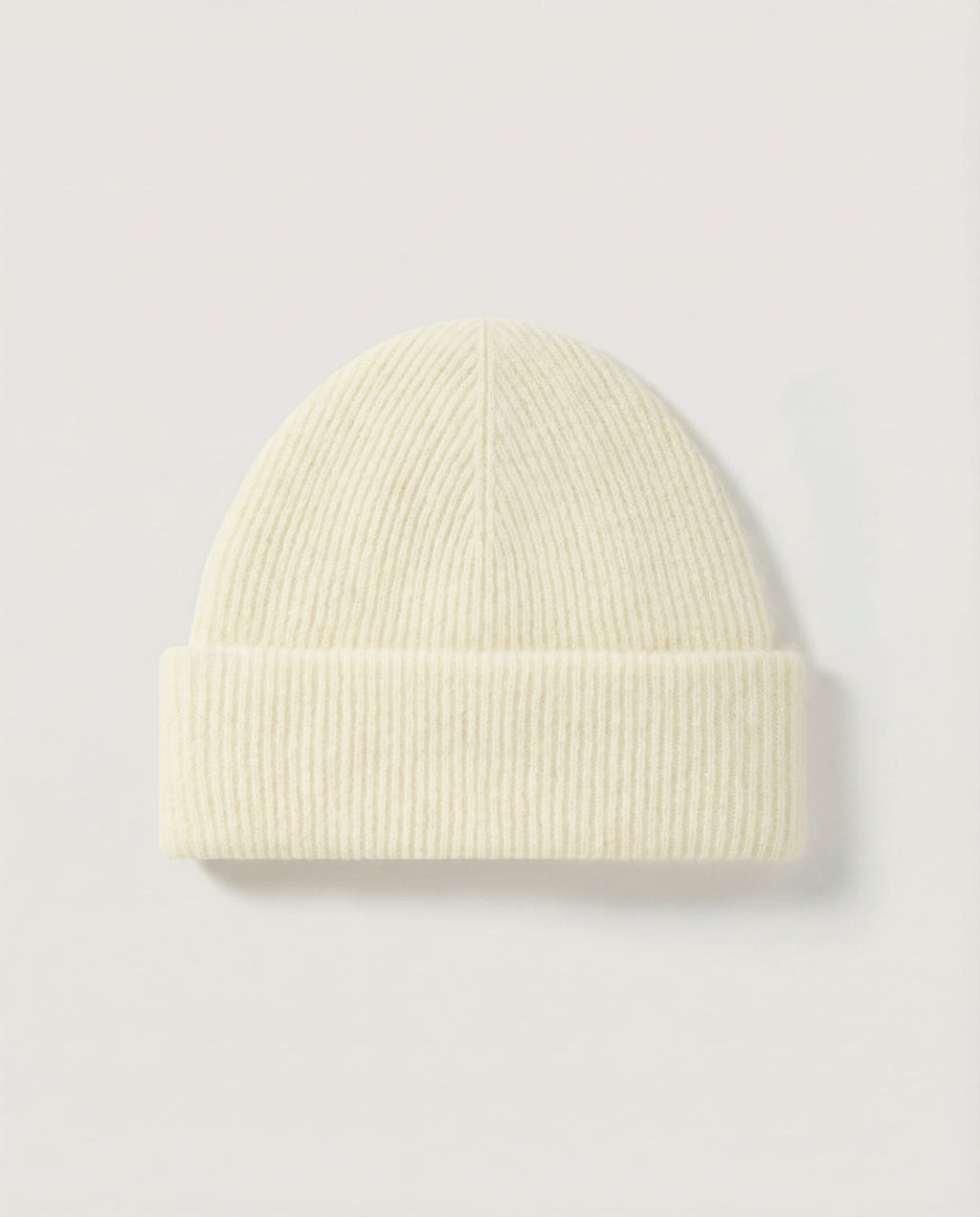 Wildfool Alashan cashmere-blend beanie in oat, charcoal, and camel — color range overhead