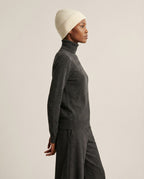 Detail of cashmere lining touching the forehead — interior softness shot