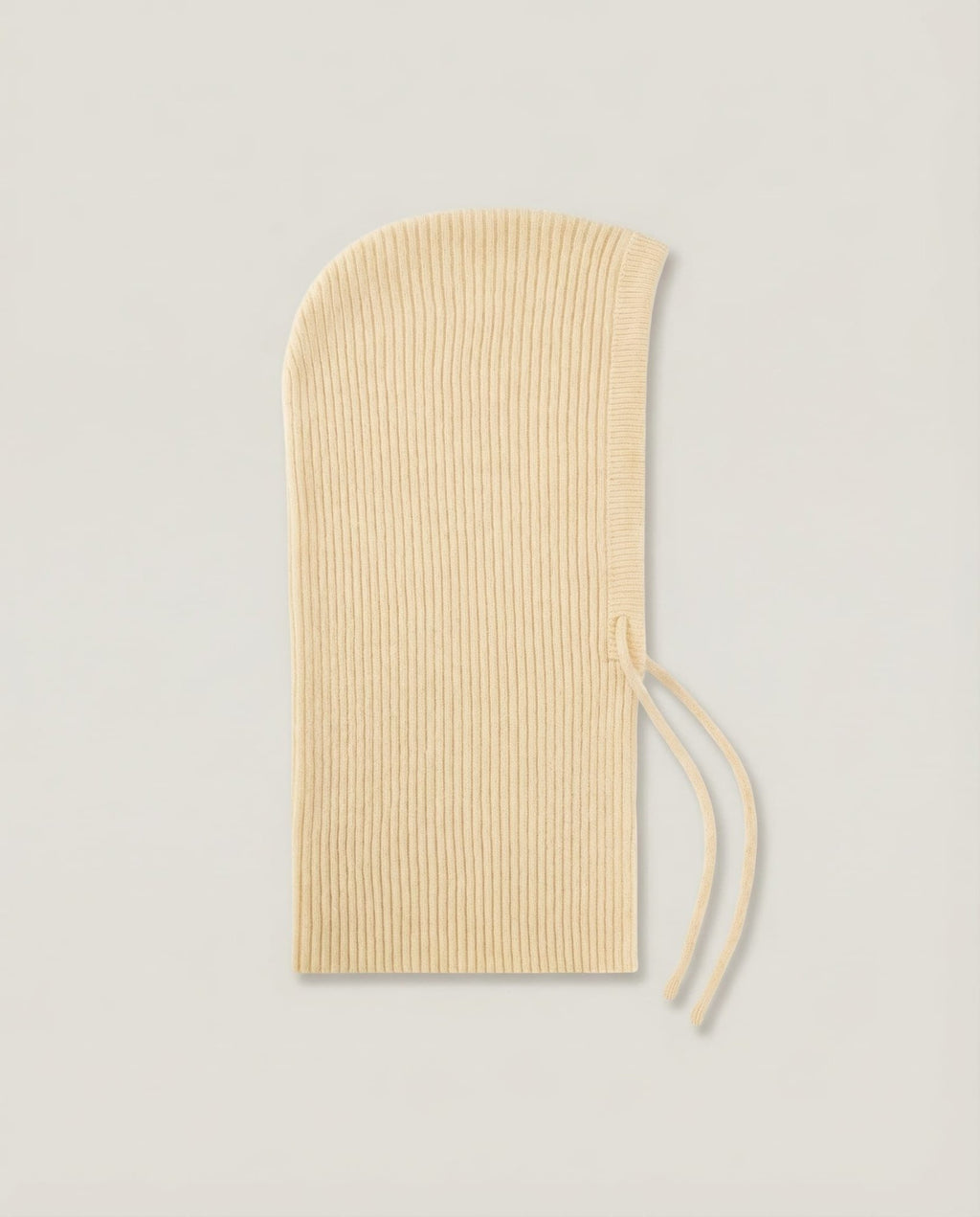 Side profile of Wildfool wool hood showing the neck-covering length