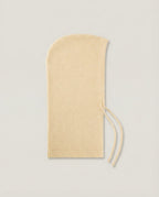 Side profile of Wildfool wool hood showing the neck-covering length