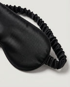 Wildfool mulberry silk blackout mask packaged in its branded gift box