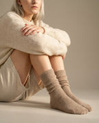 Detail of the non-binding cuff on Wildfool cashmere bed socks — no elastic mark