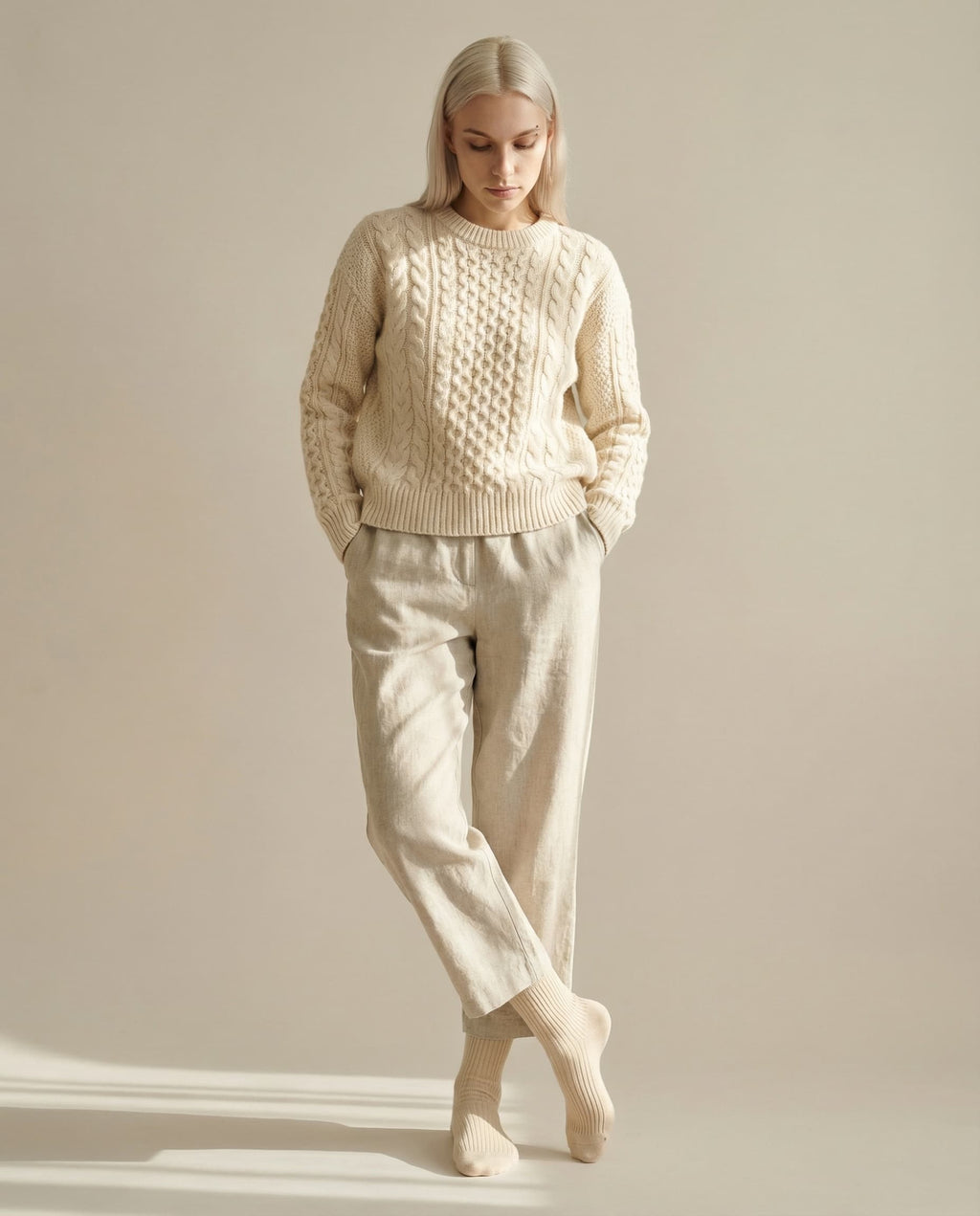 Single wool cloud sock stretched to show the ribbed slouchy cuff