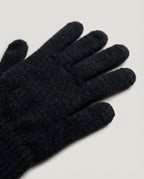 Wildfool first-shear wool tech gloves in their branded packaging