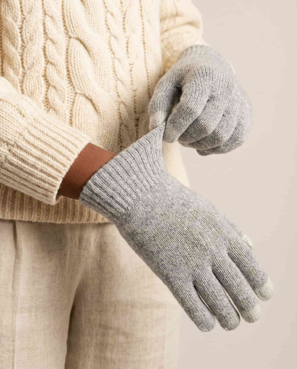 Color range overhead — charcoal, oat, navy first-shear wool tech gloves
