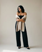 Undyed cashmere shawl worn over the shoulders — front portrait showing the natural color