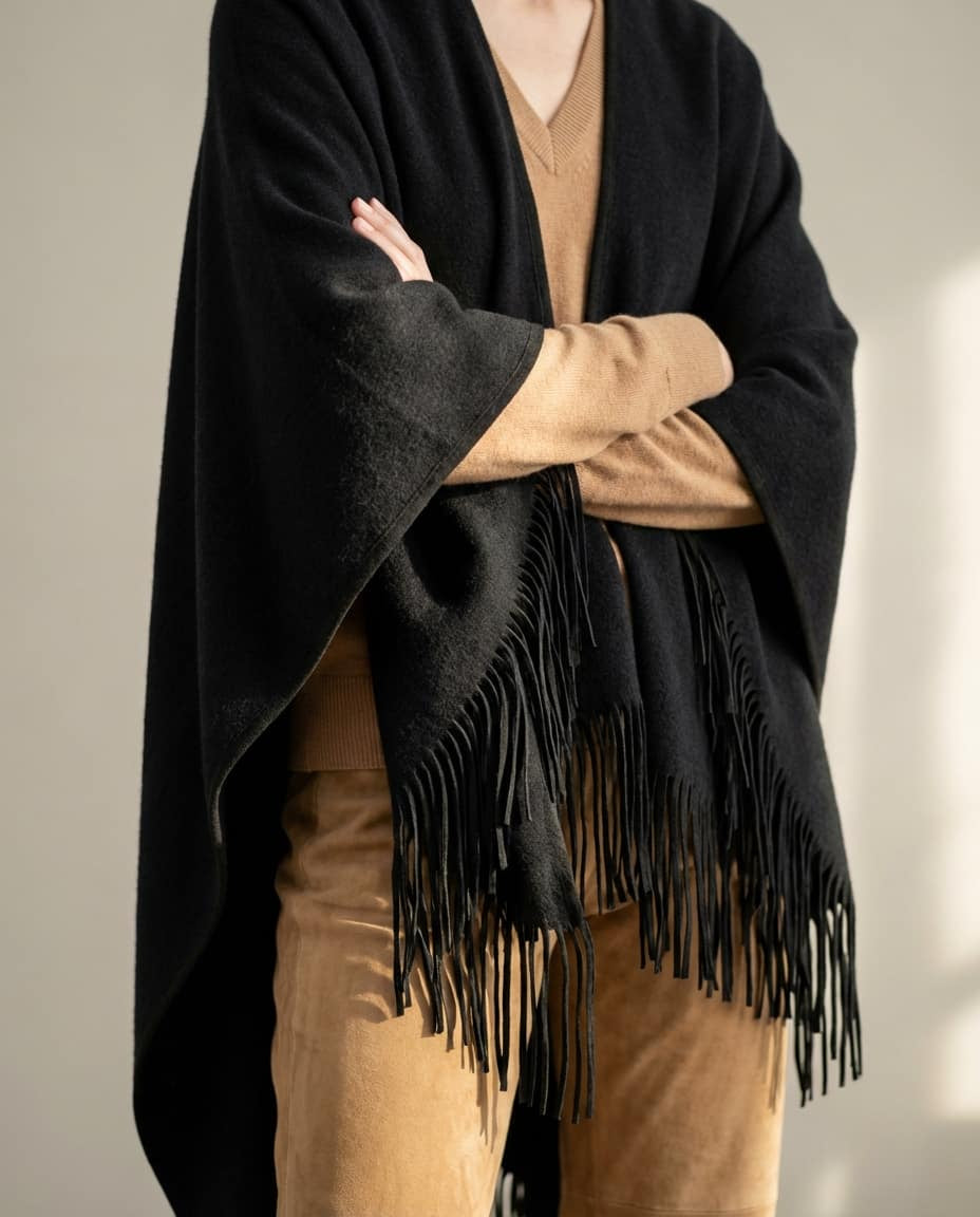 Wildfool The Suede-Fringed Cashmere Cape in Black Suede Mix - Zoom View - 100% Cashmere Body, 100% Goat Suede Fringe