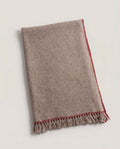 Macro close-up of the knotted fringe detail on Hohhot lambswool wrap