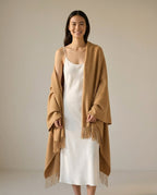 Color range overhead — charcoal, oat, deep camel nomad blanket-wraps