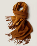 Scarf flipped to show the oat reverse side — same scarf, different mood
