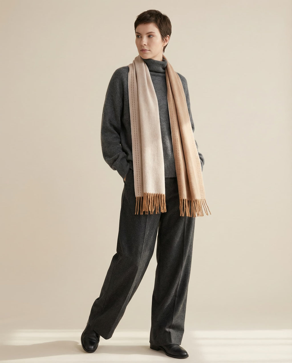 Wildfool reversible scarf folded flat showing the two-color cross section